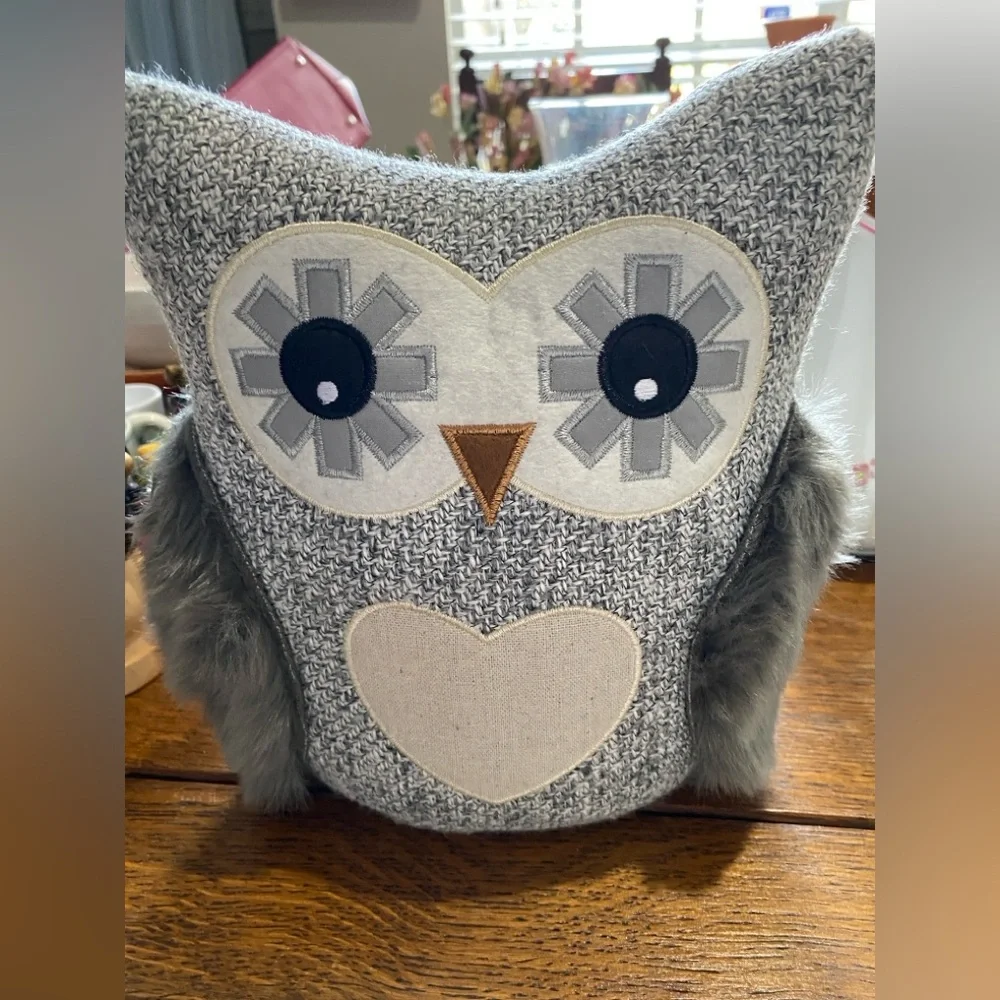 This is an Elements Weighted Fabric Owl Door Stopper. NWOT. 9 inches tall.